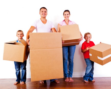 Packed boxes and furniture prepared for storage