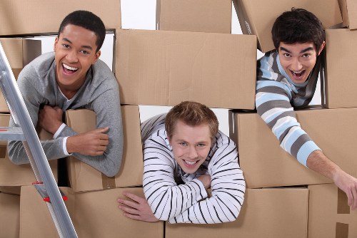 Professional removals and storage service in Westhendon with packed moving boxes