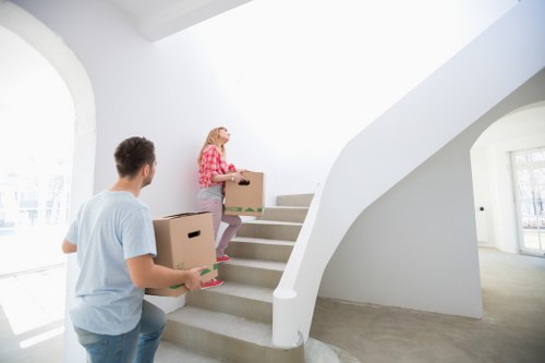 Flat removals team loading items in Westhendon