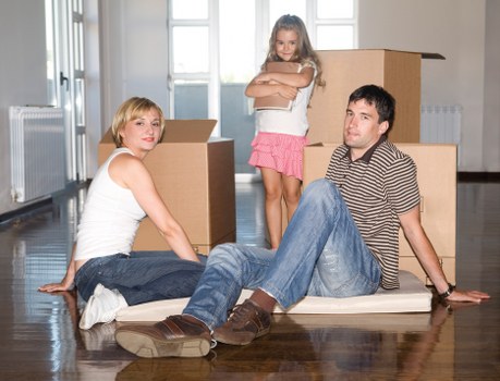 Packed boxes and furniture prepared for small removals in Westhendon